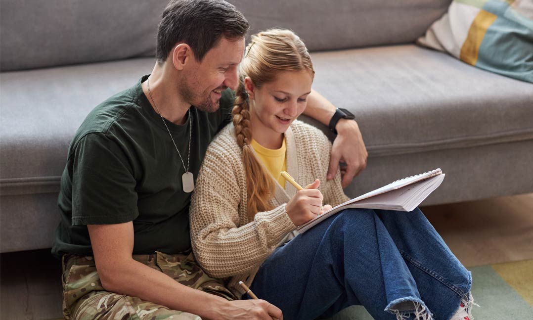 Service member talks with benefits rep