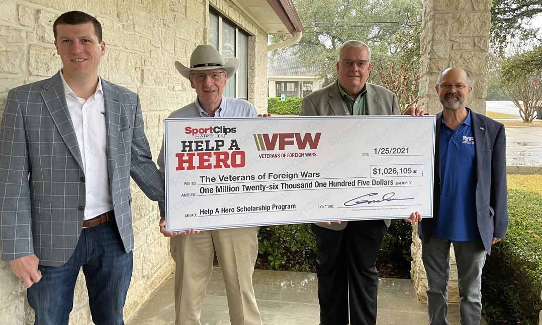 Sport Clips Haircuts donates more than $1 million for VFW for Help A Hero Scholarships. (l to r) Edward Logan, president & CEO of Sport Clips Haircuts; Gordon Logan, Sport Clips founder & chairman; Hal Roesch, VFW national commander; and Richard Potter, VFW Foundation president.